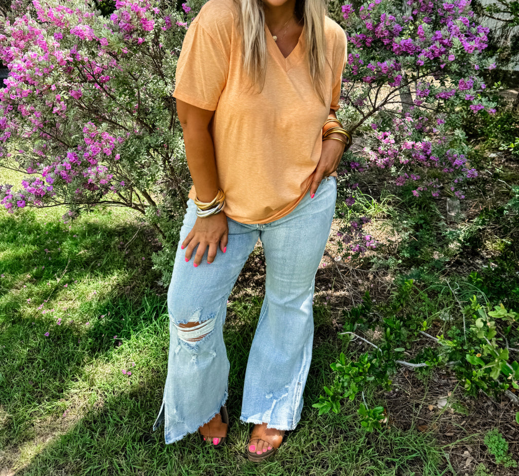 DIESEL LIGHT WASH SPLIT HEM JEANS