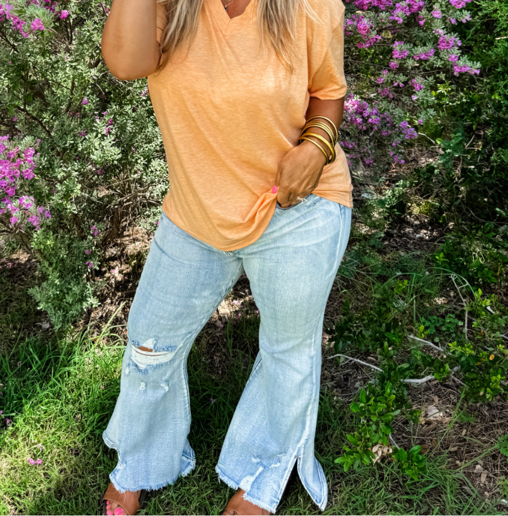 DIESEL LIGHT WASH SPLIT HEM JEANS